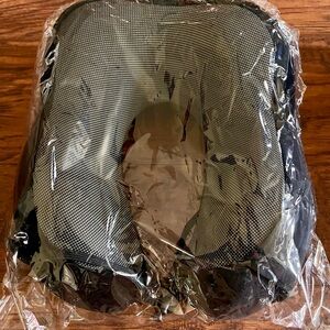 Neck pillow with adjustable strap by neck with very soft throw blanket